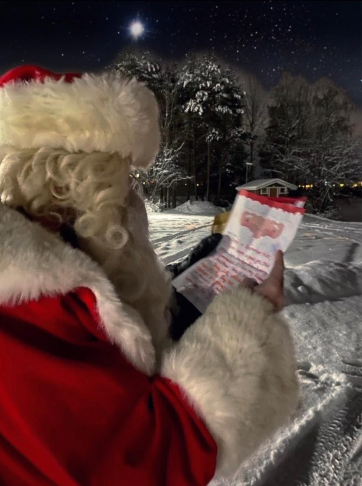 Santa reading a note